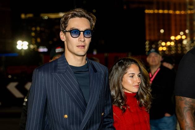23rd November 2024; Las Vegas, Nevada, USA. F1 Las Vegas Grand Prix; Race Day; George Russell (63) of United Kingdom and team Mercedes-AMG Petronas F1 Team arrives in the paddock with his girlfriend Carmen Montero Mundt  ActionPlus12719392 BobxKupbens