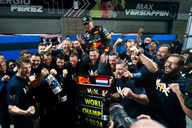 Red Bull Racing take a photo with Dutch Formula One driver Max Verstappen after clinching his fourth drivers World Championship, WM, Weltmeisterschaft following the Formula One Las Vegas Grand Prix at the Las Vegas Strip Circuit in Las Vegas on Sunday, November 24, 2024.  LAV2024112418 GREGxNASH