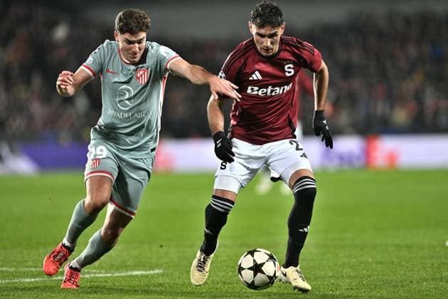 Julian Alvarez of Atletico, left, and Qazim Laci of Sparta in action during the football Champions League 5th round match Sparta Praha vs Atletico Madrid in Prague, Czech Republic, November 26, 2024. (CTKxPhoto MichaelaxRihova) CTKPhotoP2024112606855  CTKPhotoP2024112606855