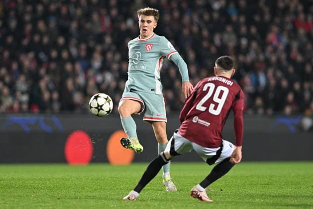 Pablo Barrios of Atletico, left, and Ermal Krasniqi of Sparta in action during the football Champions League 5th round match Sparta Praha vs Atletico Madrid in Prague, Czech Republic, November 26, 2024. (CTKxPhoto MichaelaxRihova) CTKPhotoP2024112607052  CTKPhotoP2024112607052