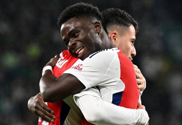 Gabriel Martinelli of Arsenal and Bukayo Saka of Arsenal celebrate the opening goal scored by Gabriel Martinelli of Arsenal Sporting Lisbon v Arsenal, UEFA Champions League, Group Stage, Football, Estadio Jose Alvalade, Lisbon, Portugal - 26 Nov 2024 EDITORIAL USE ONLY No use with unauthorised audio, video, data, fixture lists, club league logos or live services. Online in-match use limited to 120 images, no video emulation. No use in betting, games or single club league player publications. Copyright: xZedxJameson Shutterstockx 14940177ad