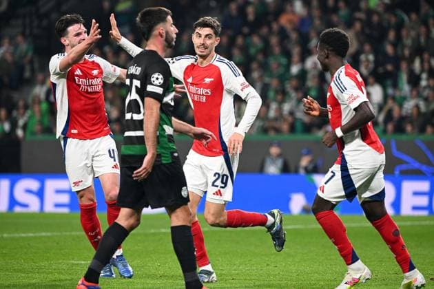 Kai Havertz of Arsenal celebrates scoring the goal for their side with their teammates to make it 2-0 Sporting Lisbon v Arsenal, UEFA Champions League, Group Stage, Football, Estadio Jose Alvalade, Lisbon, Portugal - 26 Nov 2024 EDITORIAL USE ONLY No use with unauthorised audio, video, data, fixture lists, club league logos or live services. Online in-match use limited to 120 images, no video emulation. No use in betting, games or single club league player publications. Copyright: xZedxJameson Shutterstockx 14940177az