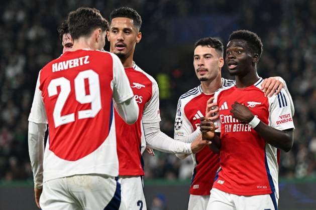 Kai Havertz of Arsenal celebrates scoring the goal for their side with their teammates to make it 2-0 Sporting Lisbon v Arsenal, UEFA Champions League, Group Stage, Football, Estadio Jose Alvalade, Lisbon, Portugal - 26 Nov 2024 EDITORIAL USE ONLY No use with unauthorised audio, video, data, fixture lists, club league logos or live services. Online in-match use limited to 120 images, no video emulation. No use in betting, games or single club league player publications. Copyright: xZedxJameson Shutterstockx 14940177ax