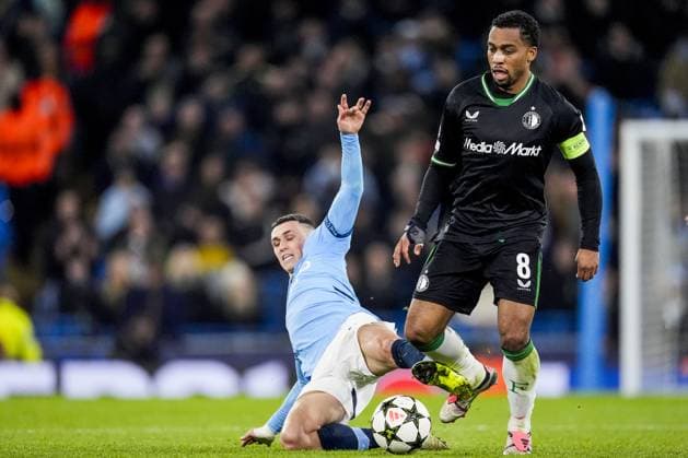 UEFA Champions League: Manchester City F.C. v Feyenoord Manchester - Phil Foden of Manchester City FC, Quinten Timber of Feyenoord during the fifth round of new format of the UEFA Champions League 2024 2025. The match is set between Manchester City and Feyenoord at Etihad Stadium on 26 November 2024 in Manchester, England. Copyright: xTomxBodex