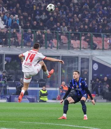 November 26, 2024, Milano, Milano, ITALIA: During the Champions League match 26 11 2024 Football match between FC International Milan vs LB Lipsia at the San Siro stadium Milan.In the photo: Christoph Baumgartner of RB Lipsia - Piotr AÂ»eliAski of internazionale Milano FC Milano ITALIA - ZUMAs236 20241126_aap_s236_020 Copyright: xFabioxSassox