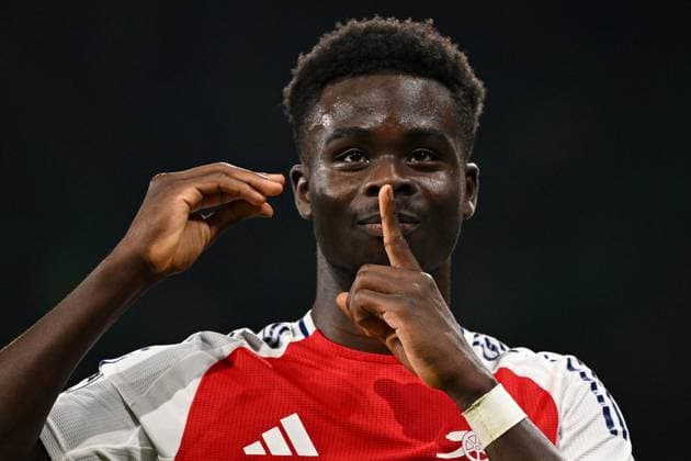 Bukayo Saka of Arsenal celebrates scoring a goal for their side to make it 4-0 Sporting Lisbon v Arsenal, UEFA Champions League, Group Stage, Football, Estadio Jose Alvalade, Lisbon, Portugal - 26 Nov 2024 EDITORIAL USE ONLY No use with unauthorised audio, video, data, fixture lists, club league logos or live services. Online in-match use limited to 120 images, no video emulation. No use in betting, games or single club league player publications.  Copyright: xZedxJameson Shutterstockx 14940177dw
