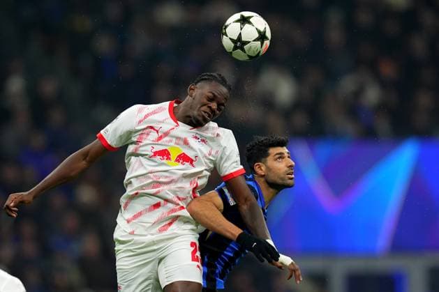 Leipzig s Castello Lukeba fights for the ball with Inter Milan s Mehdi Taremi during the Uefa Champions League soccer match between Inter and Leipzig at the San Siro Stadium in Milan, north Italy - Tuesday , November 26 , 2024. - Soccer .  Copyright: xSpada LaPressex