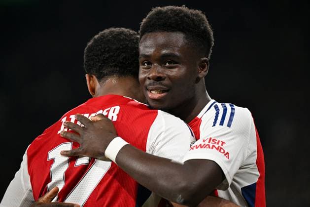 Bukayo Saka of Arsenal celebrates scoring the goal for their side with their teammates to make it 4-1 Sporting Lisbon v Arsenal, UEFA Champions League, Group Stage, Football, Estadio Jose Alvalade, Lisbon, Portugal - 26 Nov 2024 EDITORIAL USE ONLY No use with unauthorised audio, video, data, fixture lists, club league logos or live services. Online in-match use limited to 120 images, no video emulation. No use in betting, games or single club league player publications.  Copyright: xZedxJameson Shutterstockx 14940177ee
