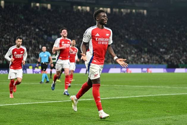 Bukayo Saka of Arsenal celebrates scoring a goal for their side to make it 4-1 Sporting Lisbon v Arsenal, UEFA Champions League, Group Stage, Football, Estadio Jose Alvalade, Lisbon, Portugal - 26 Nov 2024 EDITORIAL USE ONLY No use with unauthorised audio, video, data, fixture lists, club league logos or live services. Online in-match use limited to 120 images, no video emulation. No use in betting, games or single club league player publications.  Copyright: xZedxJameson Shutterstockx 14940177ep