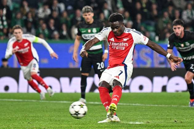 Bukayo Saka of Arsenal scores a goal for their side to make it 4-1 from the penalty spot Sporting Lisbon v Arsenal, UEFA Champions League, Group Stage, Football, Estadio Jose Alvalade, Lisbon, Portugal - 26 Nov 2024 EDITORIAL USE ONLY No use with unauthorised audio, video, data, fixture lists, club league logos or live services. Online in-match use limited to 120 images, no video emulation. No use in betting, games or single club league player publications.  Copyright: xZedxJameson Shutterstockx 14940177eg