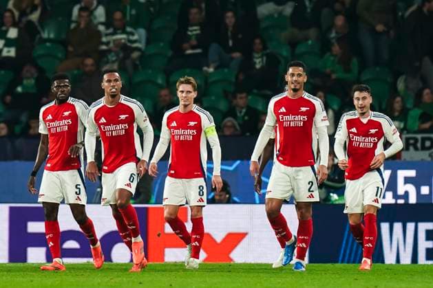 241126 Martin odegaard of Arsenal celebrates with teammates during the Champions League football match between Sporting Lisbon and Arsenal on November 26, 2024 in Lissabon. Photo: Gualter Fatia BILDBYRAN kod XY XY0033 fotboll football soccer fotball uefa champions league champions league sporting lisbon Sporting CP Sporting Lissabon arsenal bbeng jubel Copyright: GualterxFatia BB241126ZS022