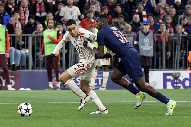 26.11.2024, xemx, Fussball UEFA Champions League, FC Bayern Muenchen - Paris St.Germain emspor, v.l. Jamal Musiala (FC Bayern Muenchen) Willian Pacho (PSG Paris St.Germain) Zweikampf, Aktion, action, battle for the ball (DFL DFB REGULATIONS PROHIBIT ANY USE OF PHOTOGRAPHS as IMAGE SEQUENCES and or QUASI-VIDEO) Muenchen
