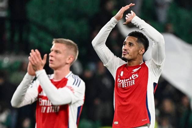William Saliba of Arsenal (R) applauds the fans at full-time Sporting Lisbon v Arsenal, UEFA Champions League, Group Stage, Football, Estadio Jose Alvalade, Lisbon, Portugal - 26 Nov 2024 EDITORIAL USE ONLY No use with unauthorised audio, video, data, fixture lists, club league logos or live services. Online in-match use limited to 120 images, no video emulation. No use in betting, games or single club league player publications.  Copyright: xZedxJameson Shutterstockx 14940177fs