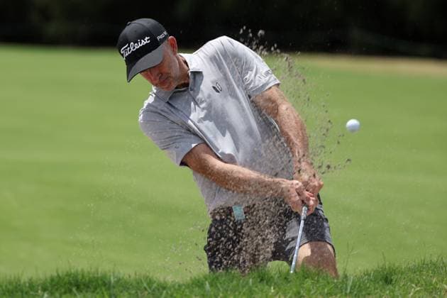GOLF AUSTRALIAN OPEN PRO AM, Geoff Ogilvy hits a plugged ball lie out of the fairway bunker 14th hole during the Australian Open Pro-Am at Kingston Heath Golf Club in Melbourne, Wednesday, November 27, 2024. ( NO ARCHIVING, EDITORIAL USE ONLY, NO USE IN BOOKS WITHOUT CONSENT Melbourne Victoria Australia  Copyright: xCONxCHRONISx 20241127174751750253