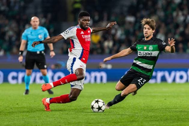 November 26, 2024, Lisbon, Portugal: Thomas Partey (L) of Arsenal and Daniel Braganca (R) of Sporting CP seen in action during the UEFA Champions League football match between Sporting CP and Arsenal at Estadio Jose Alvalade Stadium. Lisbon Portugal - ZUMAs197 20241126_aaa_s197_173 Copyright: xHugoxAmaralx