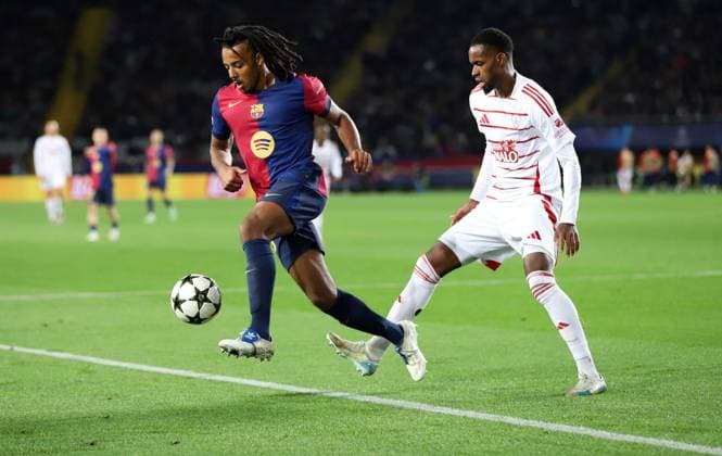 November 26, 2024, Sabadell, Barcelona, Spain: Barcelona Spain 26.11.2024 Jules Kounde FC Barcelona, Barca and Edimilson Fernandes (Stade Brestois) battle for the ball during the UEFA Champions League between FC Barcelona and Stade Brestois at Estadi Olimpic Lluis Companys on 26 November 2024 in Barcelona. Sabadell Spain - ZUMAu50_ 20241126_zsp_u50_008 Copyright: xXavixUrgelesx