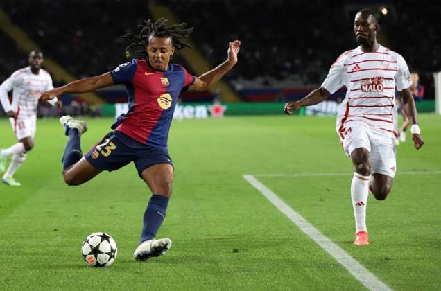 November 26, 2024, Sabadell, Barcelona, Spain: Barcelona Spain 26.11.2024 Jules Kounde FC Barcelona, Barca and Abdallah Sima (Stade Brestois) battle for the ball during the UEFA Champions League between FC Barcelona and Stade Brestois at Estadi Olimpic Lluis Companys on 26 November 2024 in Barcelona. Sabadell Spain - ZUMAu50_ 20241126_zsp_u50_045 Copyright: xXavixUrgelesx