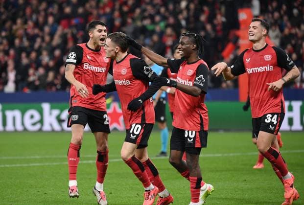 Jubel 3:0 Exequiel Palacios (Bayer 04 Leverkusen), Florian Wirtz (Bayer 04 Leverkusen), Jeremie Frimpong (Bayer 04 Leverkusen), Granit Xhaka (Bayer 04 Leverkusen), v.li. 26.11.2024, Fussball UEFA Champions League 2024 25, 5. Spieltag Bayer 04 Leverkusen - RB Salzburg 5:0 Foto: Weis TEAM2 UEFA regulations prohibit any use of photographs as image sequences and or quasi-video Leverkusen BayArena Nordrhein Westfalen Deutschland
