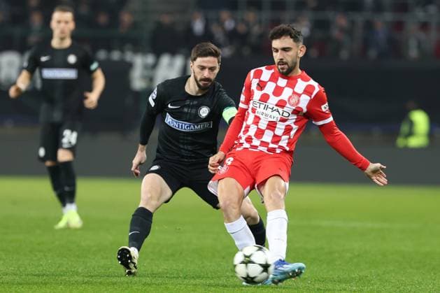 SOCCER - UEFA CL, Sturm vs Girona KLAGENFURT,AUSTRIA,27.NOV.24 - SOCCER - UEFA Champions League, SK Sturm Graz vs Girona FC. Image shows Otar Kiteishvili (Sturm) and Ivan Martin (Girona).  GEPAxpictures xChrisxBauer