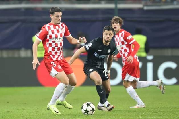 SOCCER - UEFA CL, Sturm vs Girona KLAGENFURT,AUSTRIA,27.NOV.24 - SOCCER - UEFA Champions League, SK Sturm Graz vs Girona FC. Image shows Miguel Gutierrez (Girona) and Jusuf Gazibegovic (Sturm).  GEPAxpictures xChrisxBauer