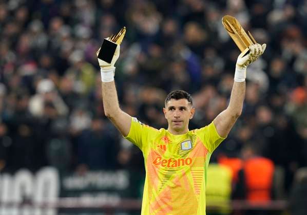 Birmingham, England, 27th November 2024. Aston Villa s goalkeeper Emiliano Martinez receives his golden gloves award during the UEFA Champions League match at Villa Park, Birmingham. Picture credit should read: Andrew Yates Sportimage EDITORIAL USE ONLY. No use with unauthorised audio, video, data, fixture lists, club league logos or live services. Online in-match use limited to 120 images, no video emulation. No use in betting, games or single club league player publications. SPI-3485-0006