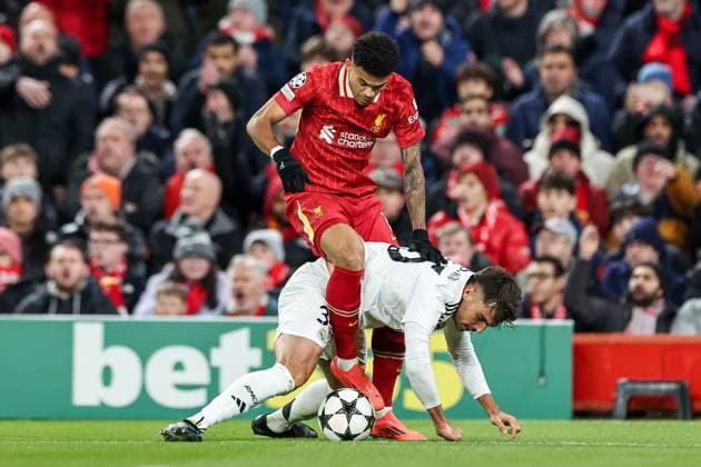 UEFA Champions League, League Phase MD5 Liverpool v Real Madrid Raul Asencio of Real Madrid is challenged by Luis Diaz of Liverpool during the UEFA Champions League, League Phase MD5 Liverpool v Real Madrid at Anfield, Liverpool, United Kingdom, 27th November 2024 (Photo by Mark Cosgrove News Images) Liverpool Anfield Merseyside United Kingdom Copyright: xMarkxCosgrove NewsxImagesx