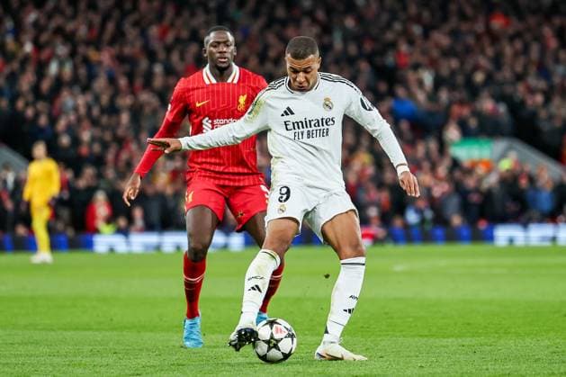 UEFA Champions League, League Phase MD5 Liverpool v Real Madrid Kylian MbappÃ of Real Madrid is put under pressure by Ibrahima Konate of Liverpool during the UEFA Champions League, League Phase MD5 Liverpool v Real Madrid at Anfield, Liverpool, United Kingdom, 27th November 2024 (Photo by Mark Cosgrove News Images) Liverpool Anfield Merseyside United Kingdom Copyright: xMarkxCosgrove NewsxImagesx