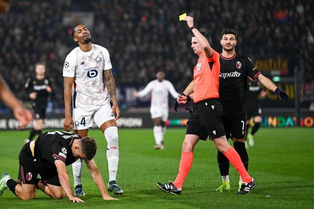 Yellow card for LillaÃ¢ÂÄÂ™s Alexsandro during Bologna FC vs LOSC Lille, UEFA Champions League football match in Bologna, Italy, November 27 2024  Copyright: xAlessioxMarini IPAxSportx xipa-ax xx IPA_51921654 IPA_Agency_IPA51921654