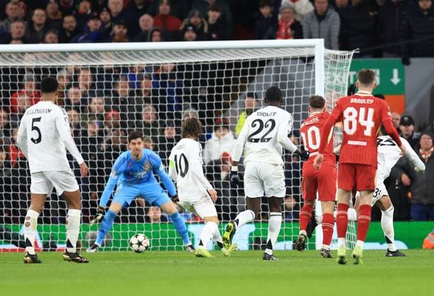 Liverpool, England, 27th November 2024. Liverpool™s Alexis Mac Allister scoring his sides opening goal during the UEFA Champions League match at Anfield, Liverpool. Picture credit should read: Jessica Hornby Sportimage EDITORIAL USE ONLY. No use with unauthorised audio, video, data, fixture lists, club league logos or live services. Online in-match use limited to 120 images, no video emulation. No use in betting, games or single club league player publications. SPI-3486-0066