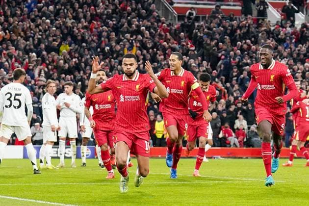 Liverpool FC v Real Madrid CF Liverpool forward Cody Gakpo (18) scores a GOAL 2-0 and celebrates during the Liverpool FC v Real Madrid CF UEFA Champions League Round 1 league phase Matchday 5 at Anfield, Liverpool, England, United Kingdom on 27 November 2024 Editorial use only. All images are copyright Every Second Media Limited. No images may be reproduced without prior permission. Copyright: xIMAGO EveryxSecondxMediax ESM-1227-0077