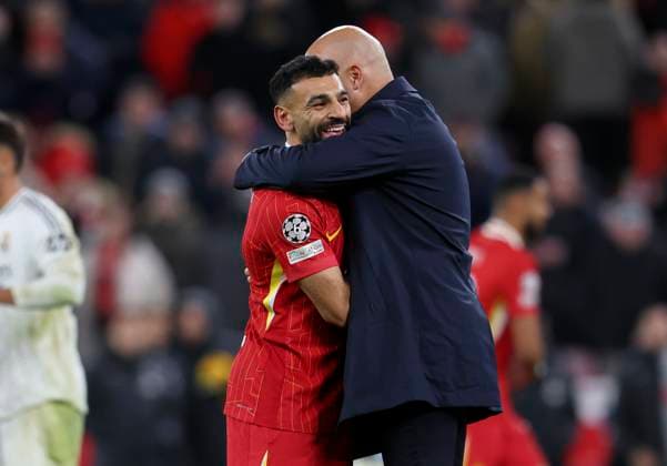 Liverpool FC v Real Madrid C.F. - UEFA Champions League 2024 25 League Phase MD5 Mohamed Salah of Liverpool and Arne Slot, Manager of Liverpool celebrate after the UEFA Champions League 2024 25 League Phase MD5 match between Liverpool FC and Real Madrid C.F. at Anfield on November 27, 2024 in Liverpool, England. Liverpool Anfield England United Kingdom Copyright: xedxSykes Sportsphoto APLx 14052951
