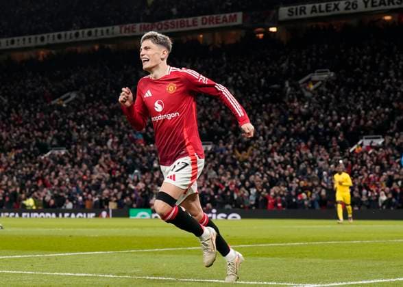 Manchester, England, 28th November 2024. Alejandro Garnacho of Manchester United, ManU celebrates scoring the first goal during the UEFA Europa League match at Old Trafford, Manchester. Picture credit should read: Andrew Yates Sportimage EDITORIAL USE ONLY. No use with unauthorised audio, video, data, fixture lists, club league logos or live services. Online in-match use limited to 120 images, no video emulation. No use in betting, games or single club league player publications. SPI-3487-0012