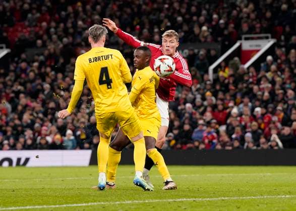 Manchester, England, 28th November 2024. Rasmus Hojlund of Manchester United, ManU scores their second goal during the UEFA Europa League match at Old Trafford, Manchester. Picture credit should read: Andrew Yates Sportimage EDITORIAL USE ONLY. No use with unauthorised audio, video, data, fixture lists, club league logos or live services. Online in-match use limited to 120 images, no video emulation. No use in betting, games or single club league player publications. SPI-3487-0061
