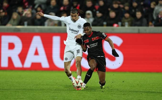 28.11.2024, Fussball UEFA Europa League, FC Midtjylland - Eintracht Frankfurt, emonline, emspor, v.l., Hugo Ekitike (Eintracht Frankfurt), Ousmane Diao (FC Midtjylland) DFL DFB REGULATIONS PROHIBIT ANY USE OF PHOTOGRAPHS AS IMAGE SEQUENCES AND OR QUASI-VIDEO. xdcx Copyright: HMBxMedia Claus