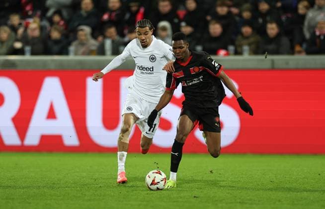 28.11.2024, Fussball UEFA Europa League, FC Midtjylland - Eintracht Frankfurt, emonline, emspor, v.l., Hugo Ekitike (Eintracht Frankfurt), Ousmane Diao (FC Midtjylland) DFL DFB REGULATIONS PROHIBIT ANY USE OF PHOTOGRAPHS AS IMAGE SEQUENCES AND OR QUASI-VIDEO. xdcx Copyright: HMBxMedia Claus
