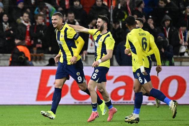 L-R Edin Dzeko, Ismail Yuksek and Alexander Djiku (all Fenerbahce) celebrate a goal during the UEFA Europa League, 5th round match: SK Slavia Praha - Fenerbahce Istanbul, in Prague, Czech Republic, on November 28, 2024. (CTKxPhoto OndrejxDeml) CTKPhotoP2024112809213  CTKPhotoP2024112809213