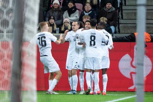 Frankfurt s players celebrate Omar Marmoush s penalty goal during the UEFA Europa League match between FC Midtjylland and Eintracht Frankfurt at MCH Arena in Herning on Thursday, November 28, 2024. (Photo: Bo Amstrup Ritzau Scanpix) , Herning Denmark Mors Copyright: BoxAmrstrupx xRitzauxScanpix BoxAmstrupx spdk20241128-233959-L
