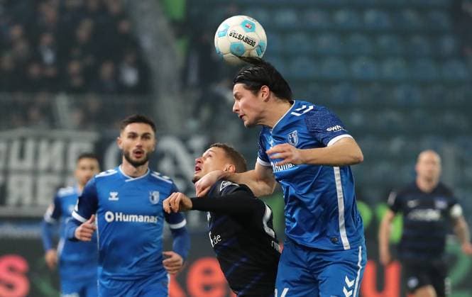 Michael Cuisance, Jean Hugonet Zweikampf Spielszene Aktion Fußball Fussball 2.Bundesliga Herren 14. Spieltag Saison 2024 2025 29.11.2024 1.FC Magdeburg FCM vs. Hertha BSC Berlin DFL regulations prohibit any use of photographs as image sequences and or quasi-video.