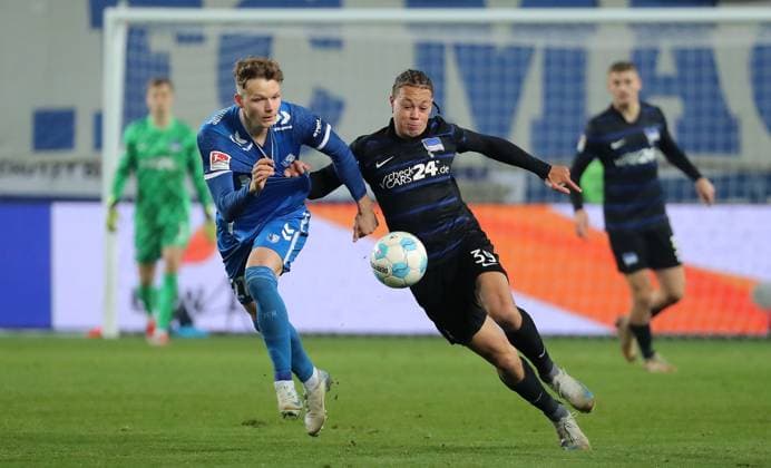 Philipp Hercher, Derry Scherhant Zweikampf Spielszene Aktion Fußball Fussball 2.Bundesliga Herren 14. Spieltag Saison 2024 2025 29.11.2024 1.FC Magdeburg FCM vs. Hertha BSC Berlin DFL regulations prohibit any use of photographs as image sequences and or quasi-video.