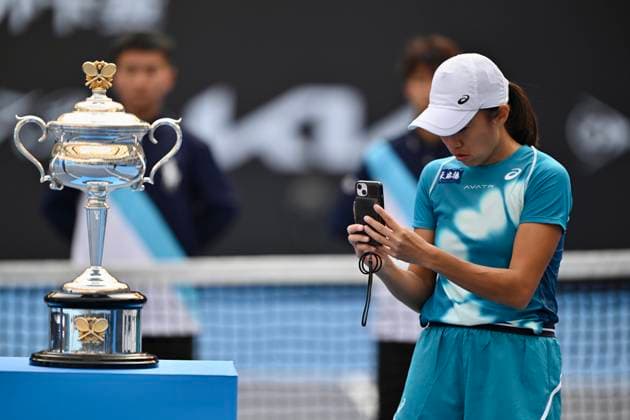 CHENGDU, CHINA - NOVEMBER 30: Champion Zhang Shuai of China takes photos of the trophy after winning the Women s Singles Final match against Guo Hanyu of China on day 6 of 2025 Australian Open Asia-Pacific Wildcard Play-off at Sichuan International Tennis Centre on November 30, 2024 in Chengdu, Sichuan Province of China.  Copyright: xVCGx 111533772440