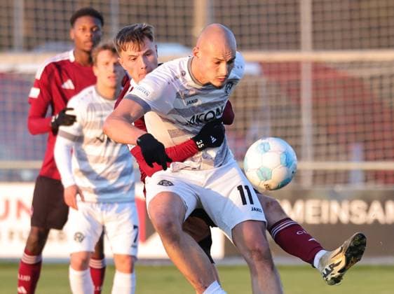 30.11.2024 - Fussball - Saison 2024 2025 - Regionalliga Bayern - 22. Spieltag: 1. FC Nürnberg FCN II ( Club ) - FC Würzburger Kickers - DaMa - xdaxmax - Simon Joachims (29, 1. FC Nürnberg FCN II ) Alem Japaur (11, Würzburger Kickers )