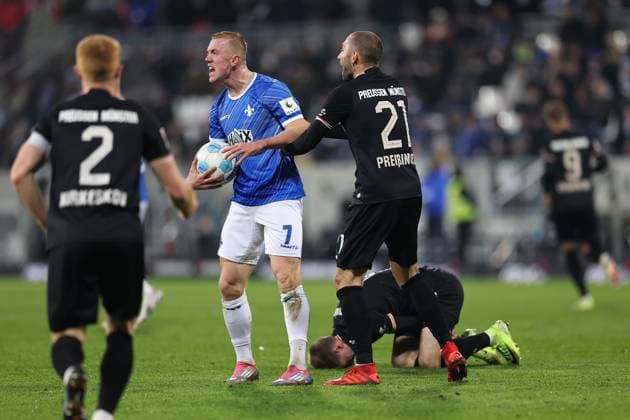 30.11.2024, xdcx, Fussball 2. Bundesliga, SV Darmstadt 98 - SC Preußen Münster, emonline, emspor, despor, v.l., Isac Lidberg (SV Darmstadt 98), Rico Preißinger (SC Preußen Münster) DFL DFB REGULATIONS PROHIBIT ANY USE OF PHOTOGRAPHS AS IMAGE SEQUENCES AND OR QUASI-VIDEO.