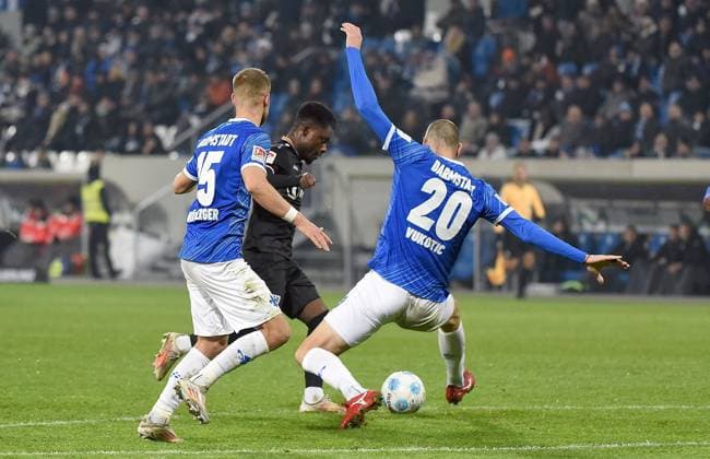 30.11.2024, xhbx, Fussball 2.Bundesliga, SV Darmstadt 98 - Preussen Münster emspor, v.l. Fabian Nürnberger (SV Darmstadt 98), Daniel Kyerewaa (Preußen Münster), Aleksandar Vukotic (SV Darmstadt 98) (DFL DFB REGULATIONS PROHIBIT ANY USE OF PHOTOGRAPHS as IMAGE SEQUENCES and or QUASI-VIDEO) Darmstadt