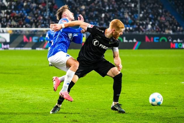 Luca Marseiler (SV Darmstadt 98, 08) im Zweikampf mit Mikkel Kirkeskov (Preußen Muenster, 02), GER, SV Darmstadt 98 vs. Preußen Muenster, Fussball, 2. Bundesliga, 14. Spieltag, Saison 2024 2025, 30.11.2024. DFL REGULATIONS PROHIBIT ANY USE OF PHOTOGRAPHS as IMAGE SEQUENCES and or QUASI-VIDEO. GER, SV Darmstadt 98 vs. Preußen Muenster, Fussball, 2. Bundesliga, 14. Spieltag, Saison 2024 2025, 30.11.2024. Darmstadt