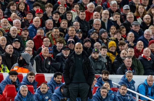 Sport Themen der Woche KW48 Sport Bilder des Tages Football - FA Premier League - Liverpool FC v Manchester City FC LIVERPOOL, ENGLAND - Sunday, December 1, 2024: Manchester City s manager Josep Pep Guardiola stands as Liverpool supporters sing You re getting sacked in the morning! during the FA Premier League match between Liverpool FC and Manchester City FC at Anfield. (Photo by David Rawcliffe Propaganda) LIVERPOOL Anfield MERSEYSIDE ENGLAND  Copyright: xDavidxRawcliffex P2024-12-01-Liverpool_Man_City-35