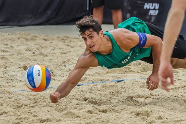 (241202) -- LAGUNA PROVINCE, Dec. 2, 2024 -- Javier Bello of England tries to save the ball during the Men s 3rd place match between Javier Bello Joaquin Bello of England and Philipp Waller Timo Hammarberg of Germany at the 2024 Volleyball World Beach Pro Tour Challenge in Laguna Province, the Philippines on Dec. 1, 2024. ) (SP)PHILIPPINES-LAGUNA PROVINCE-VOLLEYBALL WORLD BEACH PRO TOUR CHALLENGE ROUELLExUMALI 
