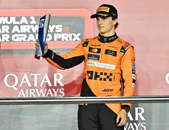 FORMULA ONE QATAR GRAND PRIX 2024 Third place Australian Formula One driver Oscar Piastri of McLaren celebrates with trophy on the podium after the Formula 1 Grand Prix of Qatar at Lusail International Circuit in Lusail, Qatar,, on December 1, 2024. DOHA Qatar Copyright: xNOUSHADx