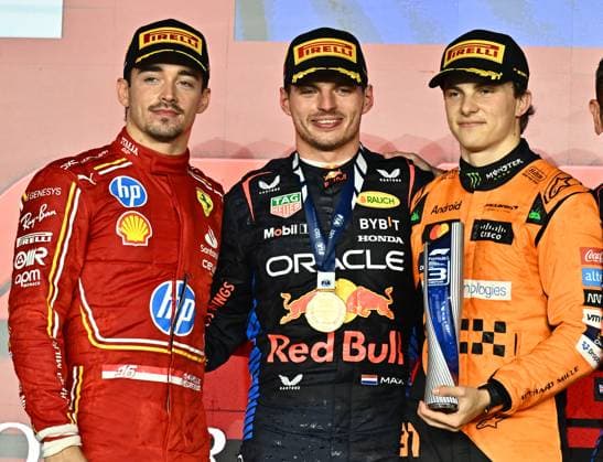 FORMULA ONE QATAR GRAND PRIX 2024 The winner Red Bull Racing driver Max Verstappen of Netherlands (C) Second-placed Scuderia Ferrari driver Charles Leclerc of Monaco, (L) and third-placed McLaren driver Oscar Piastri of Australia (R) pose on the podium after the Formula 1 Grand Prix of Qatar at Lusail International Circuit in Lusail, Qatar,, on December 1, 2024. DOHA Qatar Copyright: xNOUSHADx
