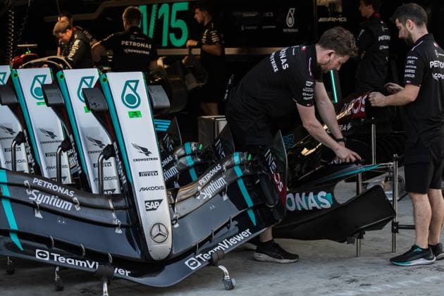 Yas Marina Circuit, Abu Dhabi, United Arab Emirates 5.December.2024; Engineers working on front wing and side pod of the Mercedes-AMG PETRONAS W15 in the garage during Formula One Abu Dhabi GP  (275332223)