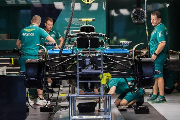 Yas Marina Circuit, Abu Dhabi, United Arab Emirates 5.December.2024; Engineers working on Aston Martin Aramco the AMR23 in the garage during Formula One Abu Dhabi GP  (275332238)